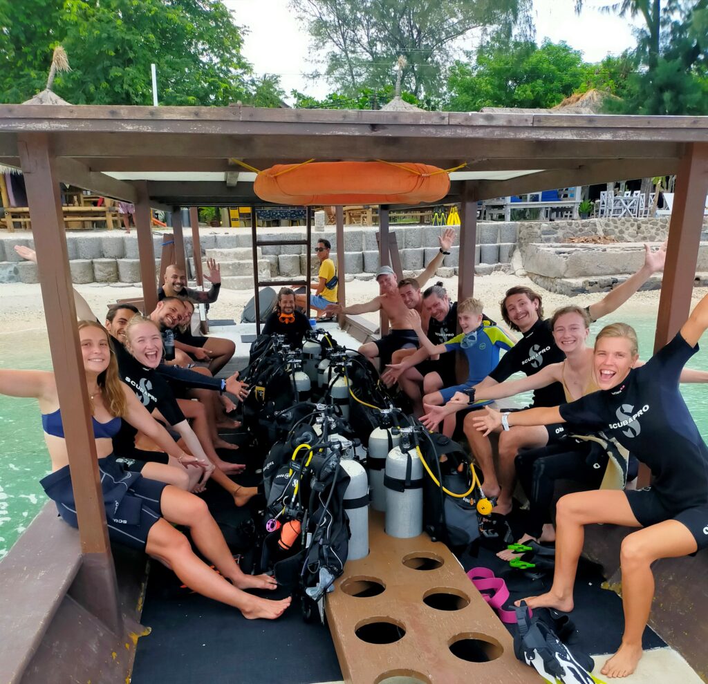 Happy scuba review, customers on a boat, refresher, doing a diving course with Next Level Scuba Dive Center