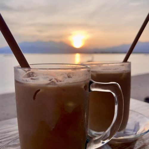 beachfront cafe sunrise coffee